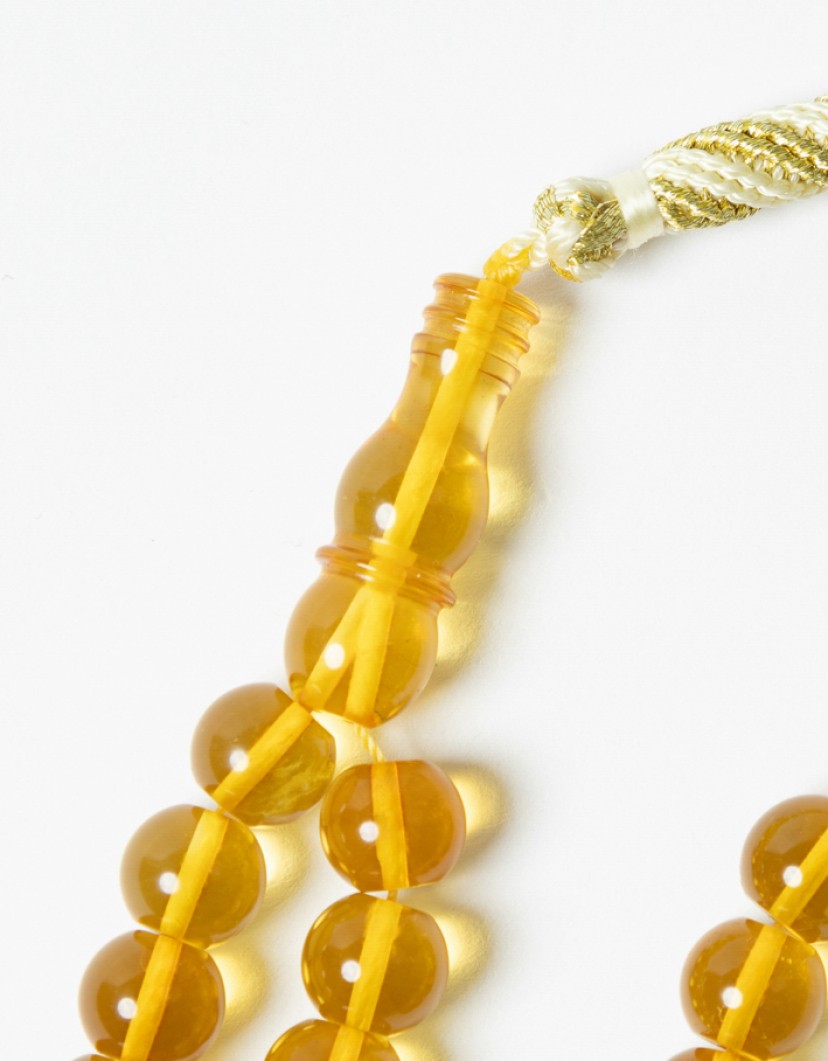 P By Privilege 99 Yellow Amber Prayer Beads with Cotton Tassel image